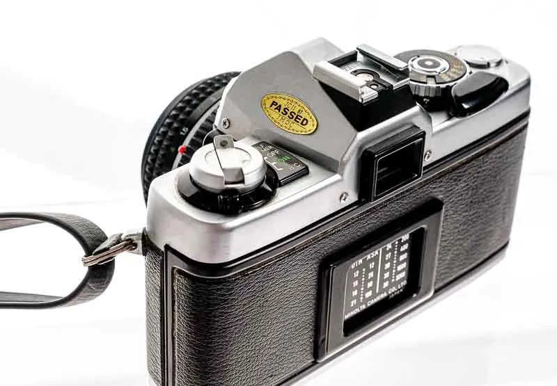 Minolta XG-2 Spiegelreflexkamera mit Objektiv 1:2/45 mm und diversem Zubehör – Bild 4