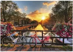 Ravensburger Puzzle 1000 Teile – Amsterdam-Kanal bei Sonnenuntergang, Fahrräder auf Brücke - Bild 2