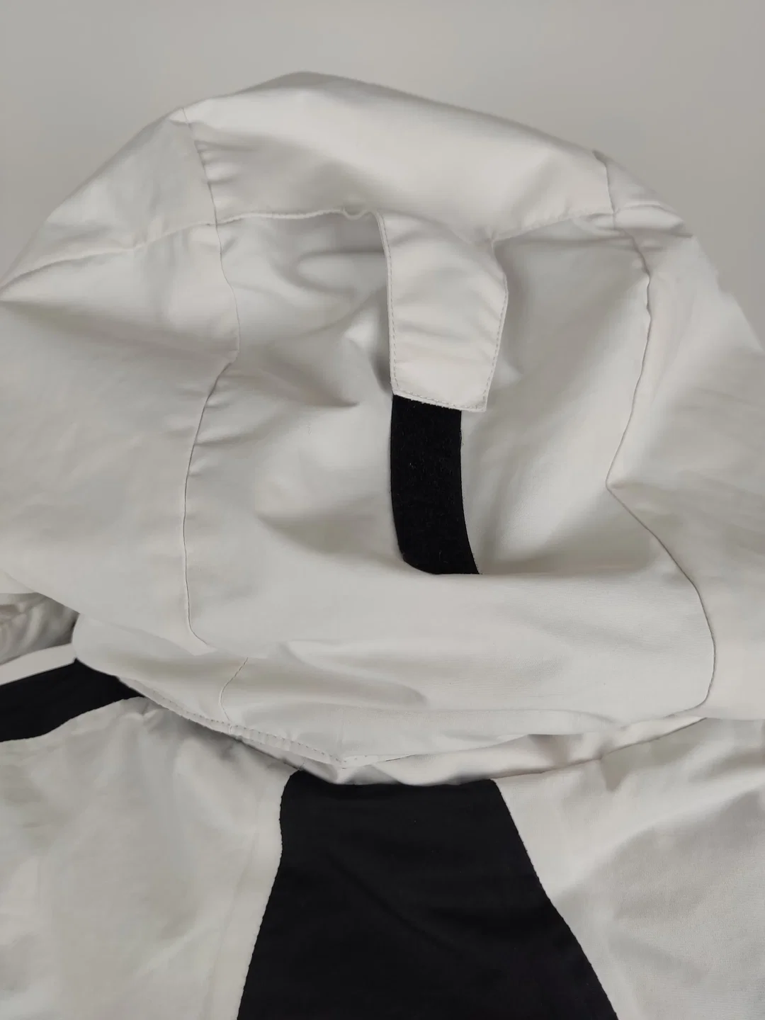 Anorak "Ski", mit Kapuze, weiß/schwarz mit Aufdruck, Größe 56/58 – Bild 7