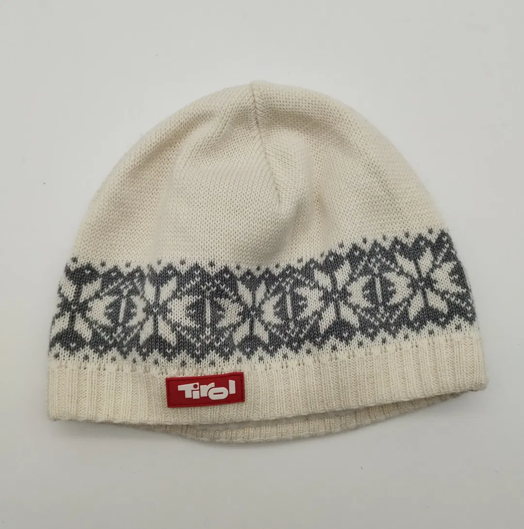 Winterliche Tirol Haube - 50% Schurwolle, 50% Polyacryl - Bild 1