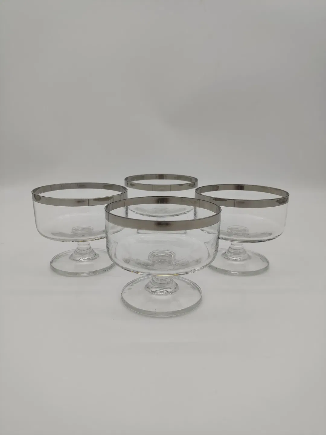 4 Glasschalen mit Silberrand D/9,5 cm - Bild 1